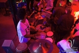 PERCUSSIONIST PERFORMING IN WAREHOUSE